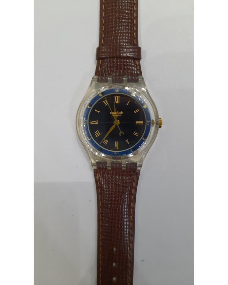 Solar-powered Swatch watch, GUFO SRK101 in brown, blue and gold // 52 USD –  Haute Juice